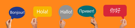 Speech bubbles with hello, greeting word in diverse foreign languages. French, Spanish, German,...