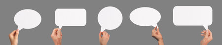 Speech bubble held in hand, symbolizing communication and dialogue. Empty space for thoughts, opinions, or replies, perfect for social media, feedback, or business discussions. Modern concept forの写真素材