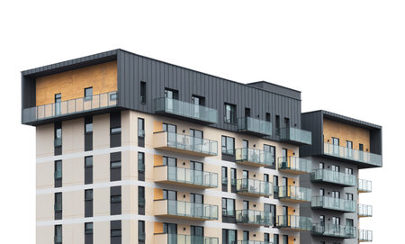 Modern apartment building with glass balconies and geometric facade. Contemporary urban housing...