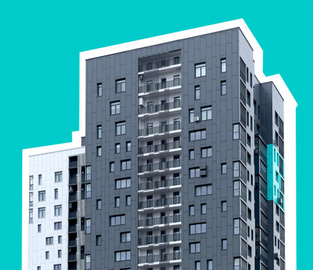 Tall modern apartment building with structured facade and multiple windows. Urban highrise...