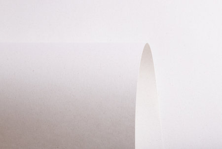 Premium monochrome paper texture with a minimalistic design and elegant folds. The pastel, matte finish and abstract gradient create a simple yet sophisticated backdrop, perfect for designer paperの写真素材
