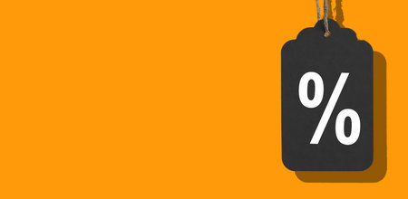 Black Friday tag banner. Minimal black label with bright orange accents and hanging loop, symbol of sale, price off, and discount offer, elegant autumn design for retail, fashion, and businessの写真素材