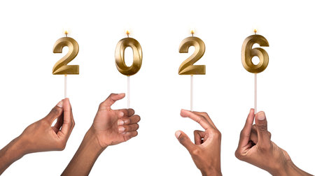 Golden 2026 celebration. African American man holding shiny metallic numbers symbolizing new beginnings, hope, and success, elegant festive design representing progress, teamwork, and joyfulの写真素材