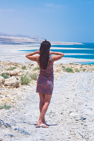 Young woman going to Dead Sea, Israelの写真素材