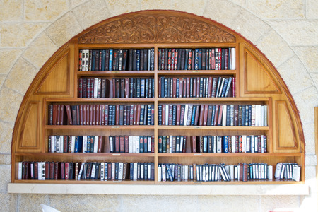 Jerusalem , Israel - January 22, 2015 : Shelves with religious literature in the synagogue next to the Wailing Wall in Jerusalem.のeditorial素材