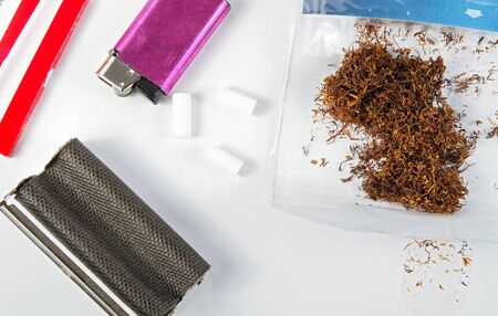 Components and tools for making homemade cigarettes .の写真素材