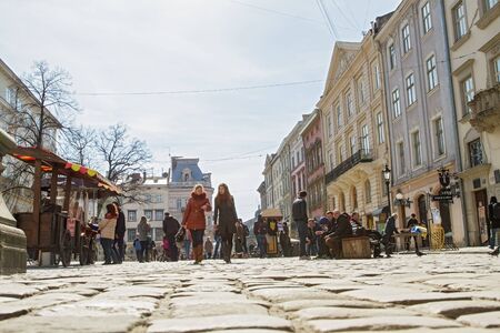 Lviv , Ukraine - March 21, 2015 :  Old Town . People walking in the area . Lviv is the largest city...