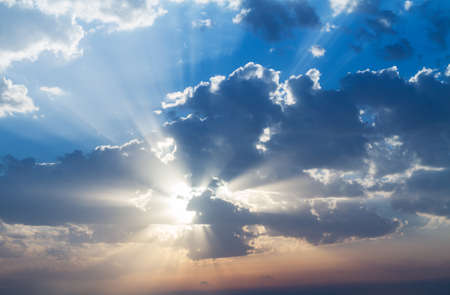 Beautiful white clouds on a blue sky background .