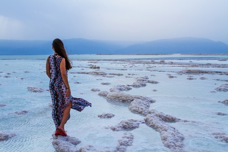 Young woman going to Dead Sea, Israelの写真素材