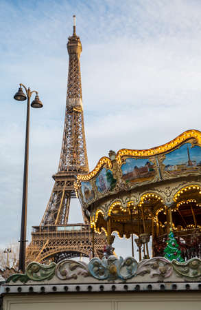 View on the famous paris eiffel tower from the side of the carousel .のeditorial素材