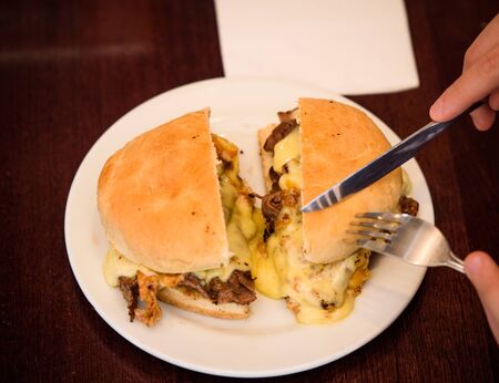 Chilean sandwich with meat and cheeseの写真素材