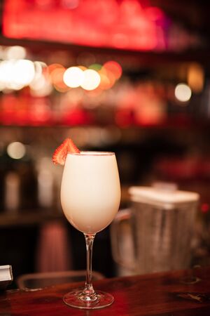 strawberries with pineapple spirit with ice in a cupの写真素材