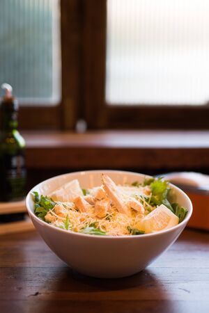 a fresh salad with nice dressingの写真素材