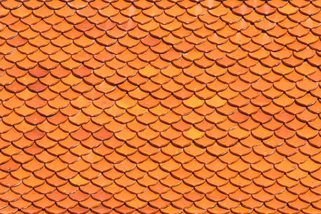 Ceramic roof of monk's hermitage in Buddhist temple in Thailand.の写真素材