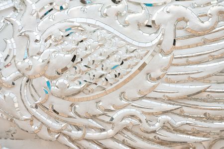 Wing of fairy tale bird in Thai molding art, Wat Rong Khun, Chian Rai province, Thailandの写真素材