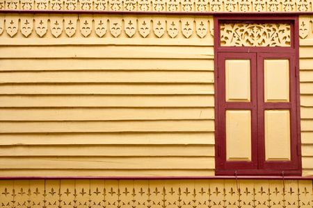 Window and Thai style wood carving, monk's house in Wat Suan Plu, Bangkok, Thailandの写真素材