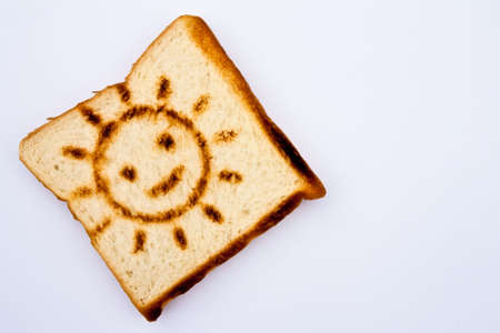 Toast with smiling sun burnの写真素材