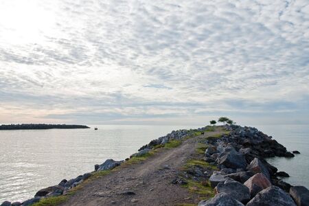 Stone jetty of Cha Am bay, Thailandの写真素材