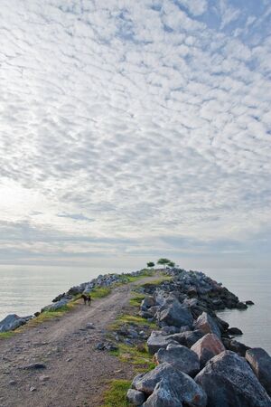 Stone jetty of Cha Am bay, Thailandの写真素材