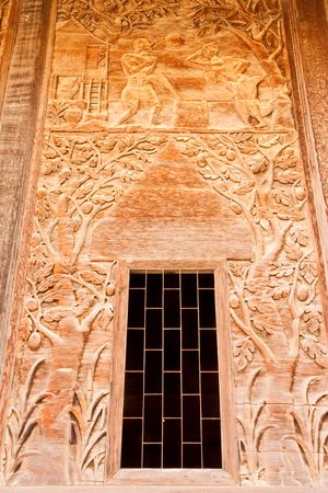 Wall of church, over 80 years old teakwood ecgraving, Thailandの写真素材