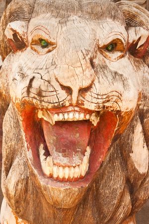 Lion in Thai style wood carvingの写真素材