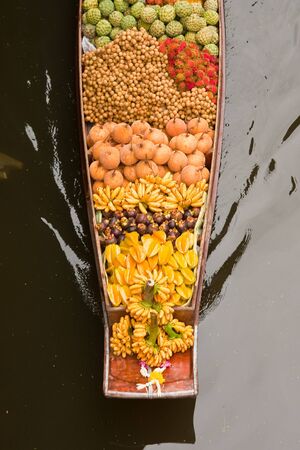 Fruits boat in floating market, Thailandの写真素材