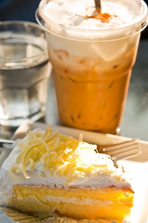 Piece of cak and ice coffeeの写真素材