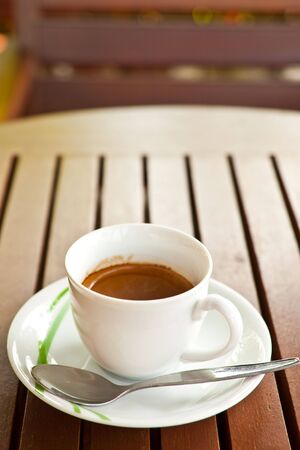 Coffee cup on wood tableの写真素材