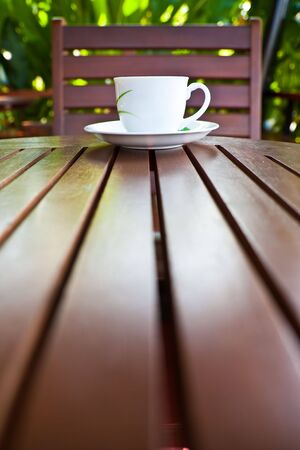 Coffee cup on wood tableの写真素材