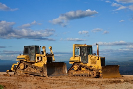 Tractor in construction site on high mountainの写真素材