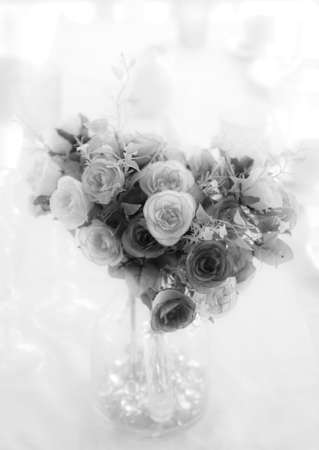 Artificial flower on table in dinning roomの写真素材