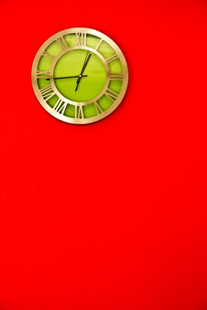 Clock on bright color wallの写真素材