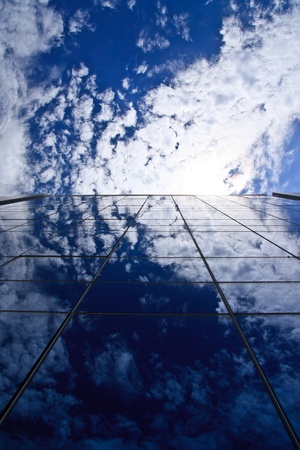 Blue sky on office buildingの写真素材