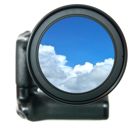 Camera lense and blue sky inside