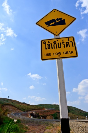 Use low gear sign of road on high mountainの写真素材