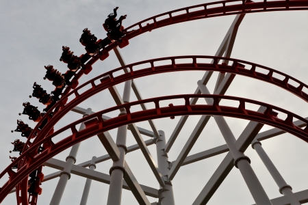 Line of red roller coaster rail