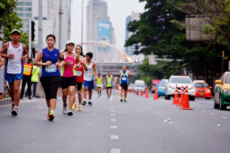 BANGKOK, THAILAND - JULY 29   Unidentified  runner s on the street  during  Adidas King of the Road 2012  running championship on July 29, 2012 in Bangkok, Thailand のeditorial素材