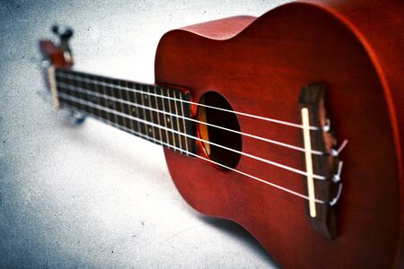 Ukulele processed in grunge styleの写真素材
