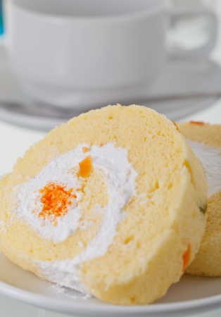 Cake with coffee cup in backgroundの写真素材