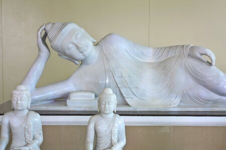 Buddha carve with white jadeの写真素材