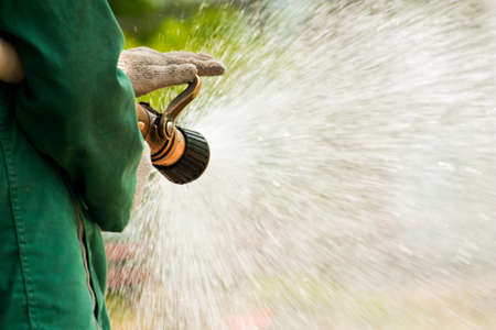 Water flow form hose of firemanの写真素材