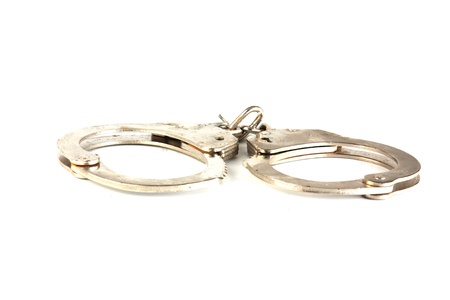 Handcuffs isolated on white backgroundの写真素材