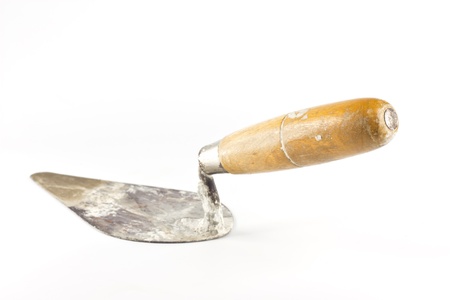 Old dirty trowel isolated on white backgroundの写真素材