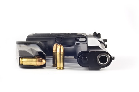 9 mm. beretta gun and magazine isolated on white background