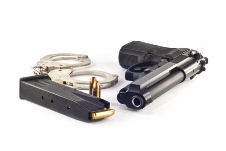 9 mm.beretta gun and magazine isolated on white background