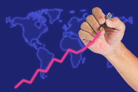 Hand drawing raise graph on blue world map background