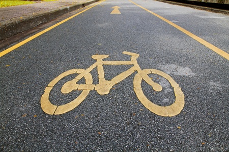 Bicycle symbol in bicycle lane in the parkの写真素材
