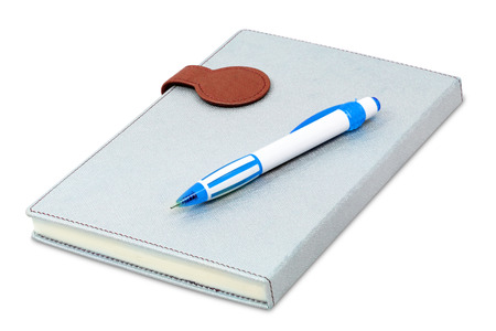 Notebook and pen isolated on white backgroundの写真素材