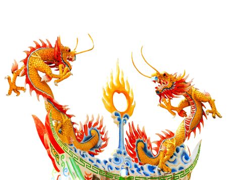 Double dragon statues in chinese temple on white background.の写真素材