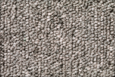 The texture of old dirty doormat with small pebble on white background.